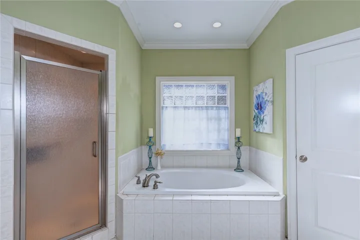 Primary bathroom tub/shower and water closet