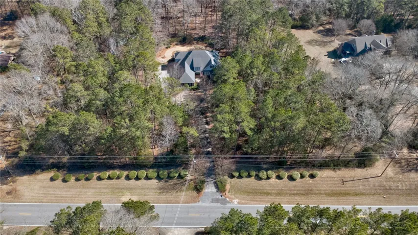 Neighbors with lovely homes are on each side but  everyone has large lots for privacy