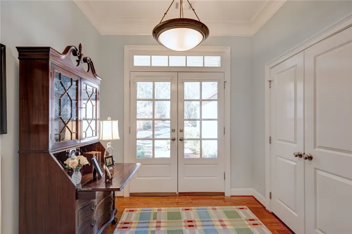 Front double doors with storage in the entrance hall