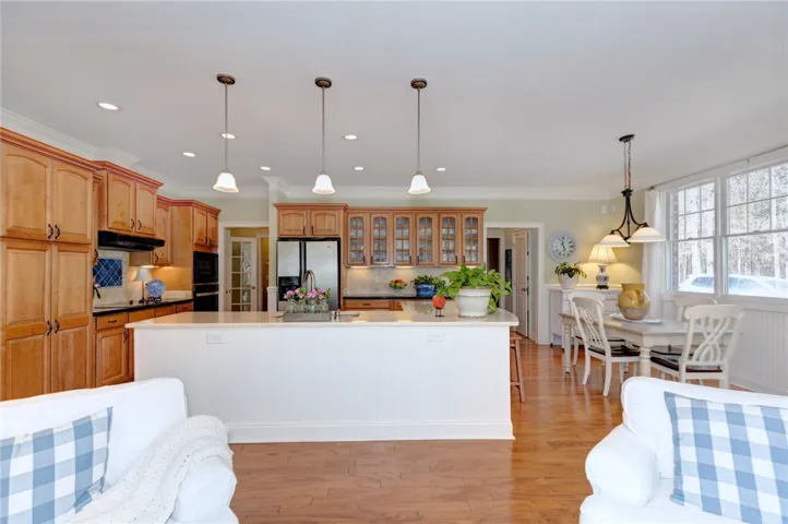 Sun room view into kitchen and breakfast area