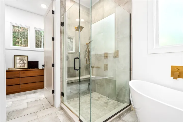 Full glass master shower with rain head