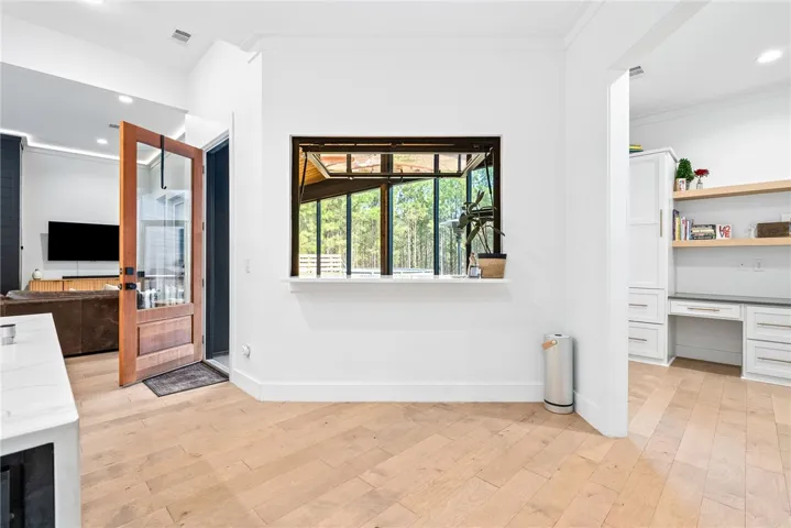 Custom patio bar with flip out window