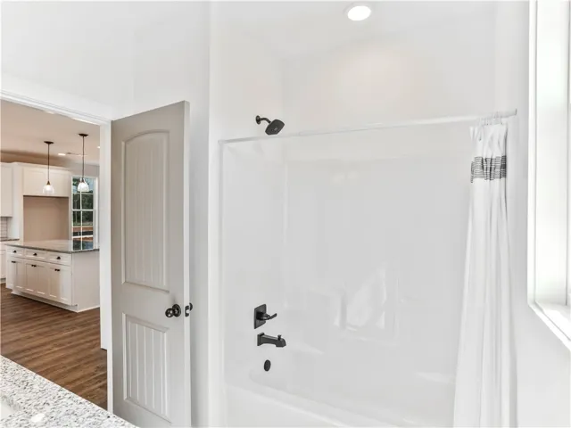 Example of a completed Tate A. All plans, pricing and specifications are subject to change without notice.
