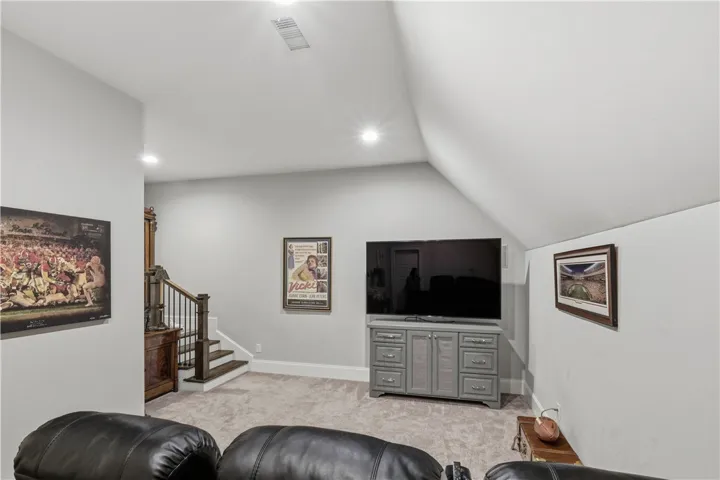 Located on the second floor, the theater room is tucked away from the bedrooms.