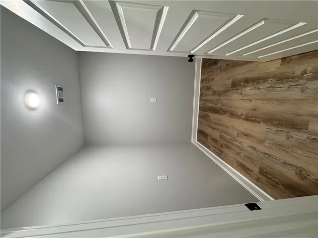 This interior space features durable flooring and a stylish ceiling design.