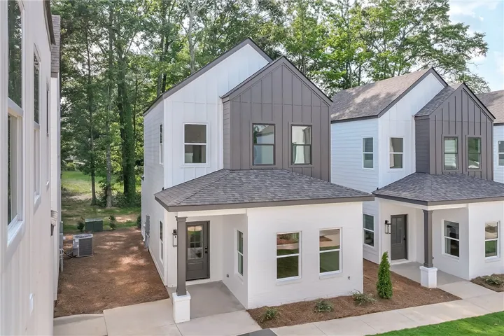 Clean lines and a striking modern exterior define this charming new construction home.