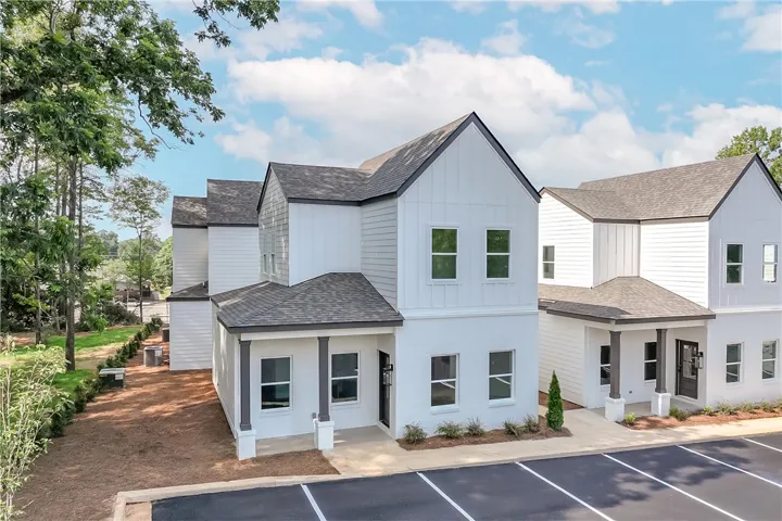 Clean lines and classic design define these modern townhomes with ample parking.