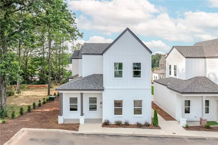 Clean lines and modern design define this pristine new construction, offering contemporary living.
