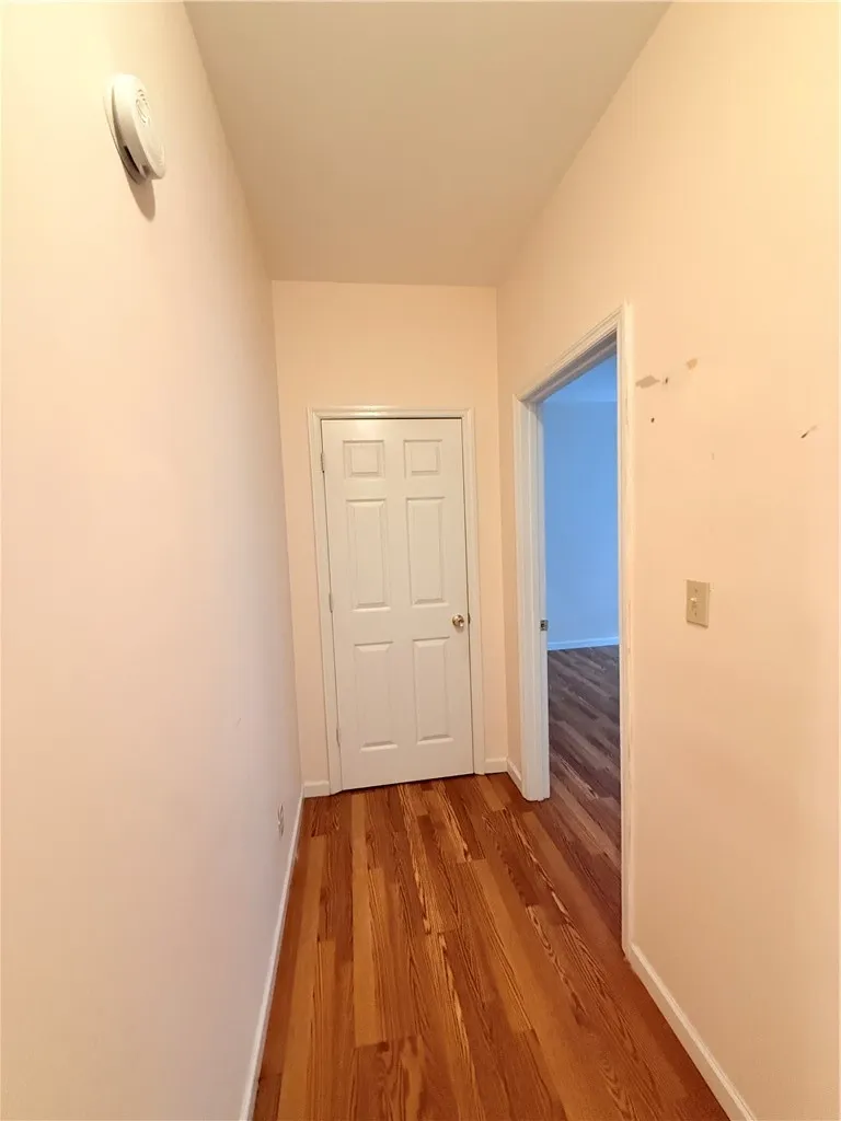 Hallway to bedroom 6 and storage closet