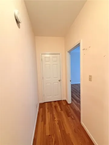 Hallway to bedroom 6 and storage closet