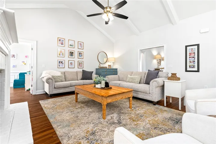 Spacious living room with vaulted ceiling and gas fireplace
