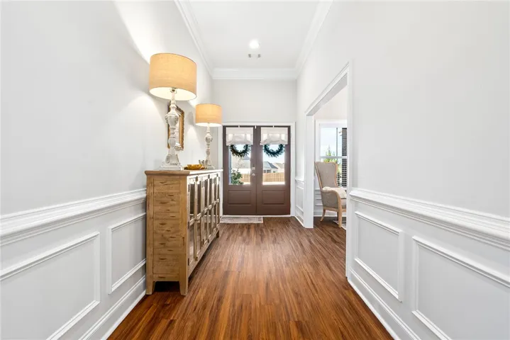 Beautiful entry way with judges paneling