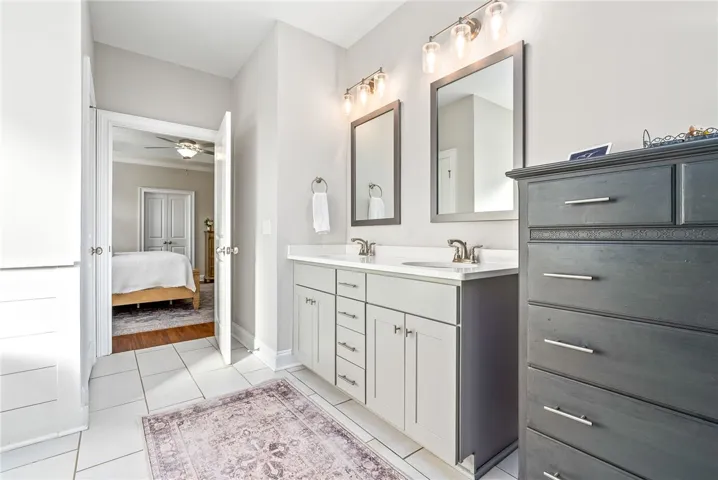 En suite with free standing soaking tub and walk-in shower