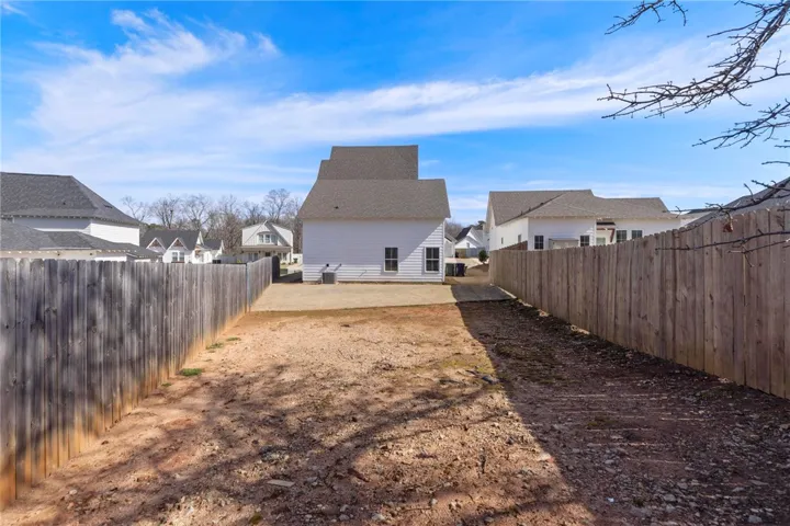 Backyard with view of rear of hoome