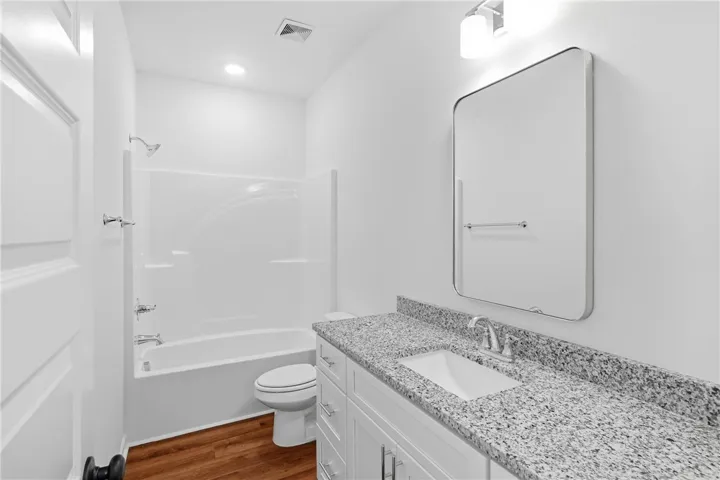 The Trace plan by Holland Homes LLC on lot 104. All plans, pricing, and specifications are subject to change without notice.