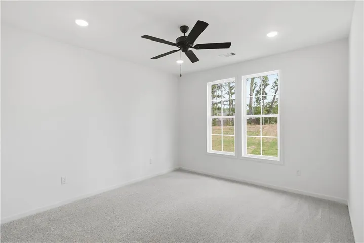 The Trace plan by Holland Homes LLC on lot 104. All plans, pricing, and specifications are subject to change without notice.