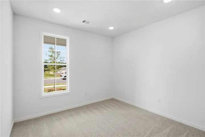 The Trace plan by Holland Homes LLC on lot 104. All plans, pricing, and specifications are subject to change without notice.