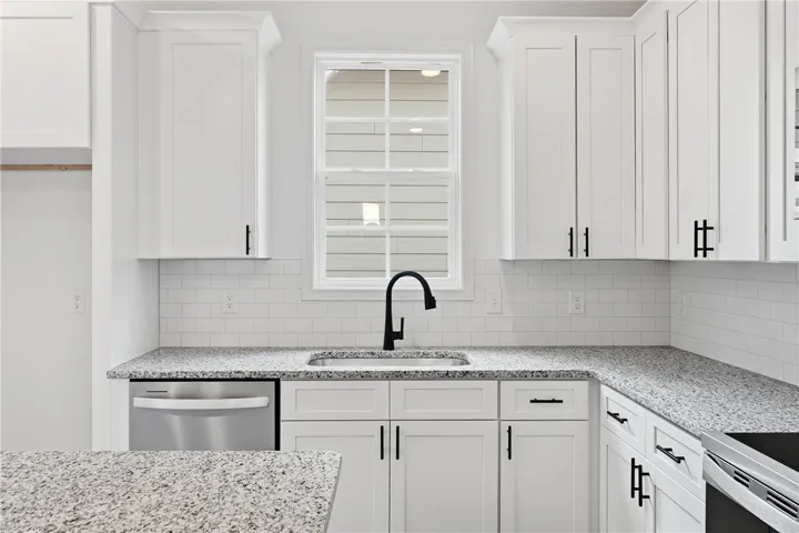 The Trace plan by Holland Homes LLC on lot 104. All plans, pricing, and specifications are subject to change without notice.