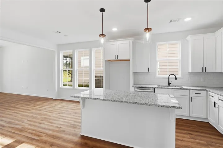 The Trace plan by Holland Homes LLC on lot 104. All plans, pricing, and specifications are subject to change without notice.