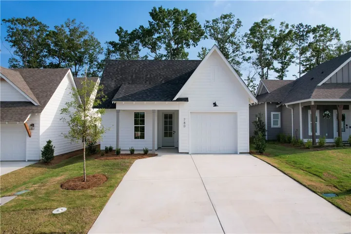 The Trace plan by Holland Homes LLC on lot 104. All plans, pricing, and specifications are subject to change without notice.