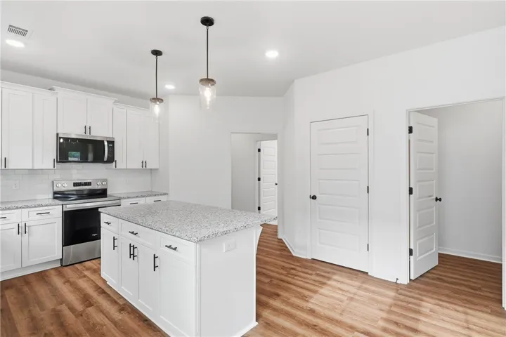 The Trace plan by Holland Homes LLC on lot 104. All plans, pricing, and specifications are subject to change without notice.