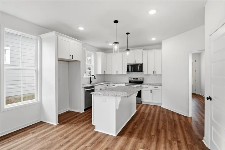 The Trace plan by Holland Homes LLC on lot 104. All plans, pricing, and specifications are subject to change without notice.