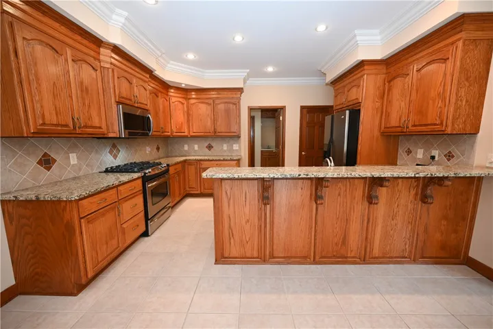 Spacious kitchen overlooks the patio