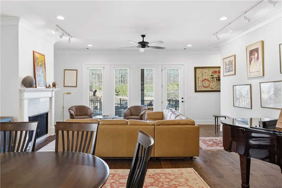 The open layout offers flexibility for substantial furnishings, including a grand piano.