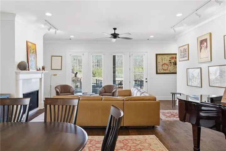 The open layout offers flexibility for substantial furnishings, including a grand piano.