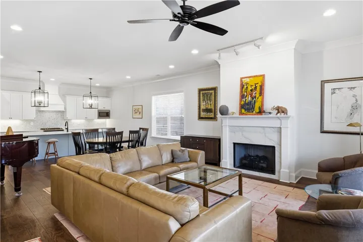Open sightlines connect the kitchen, dining area, and living room.