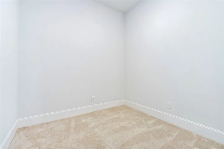 A flex room at the owner's entry can serve as a study, music space, playroom, or storage.