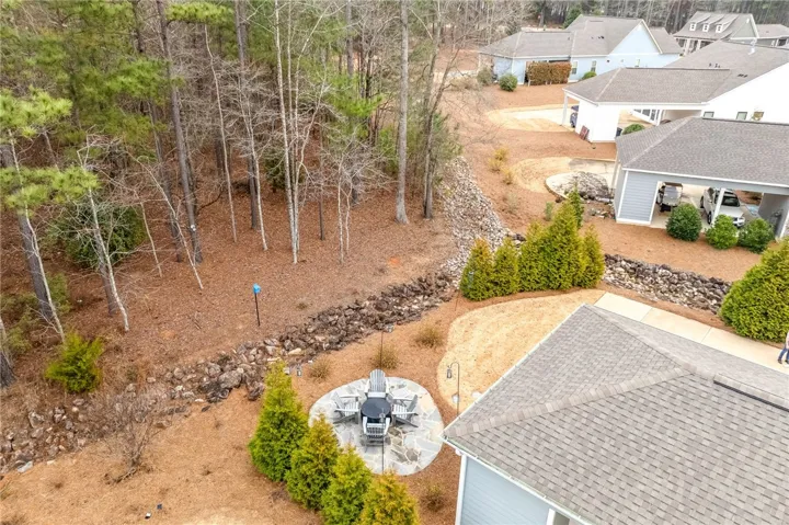 fire pit overlooking wooded area