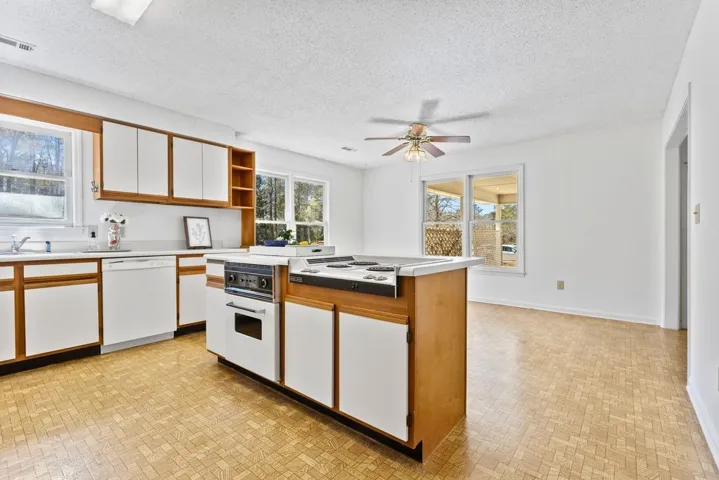 Kitchen, refrigerator conveys with the home