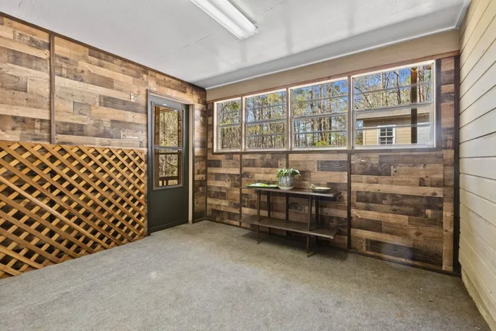 Sunroom with utility closet, water heater