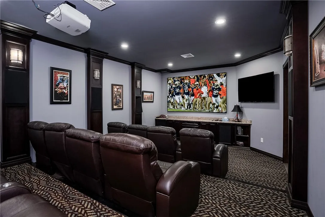 Theater Room with screen and TV. Theater seating and sound to remain.