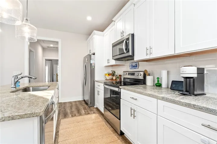 Well-kept interior with stylish finishes and a move-in-ready feel.