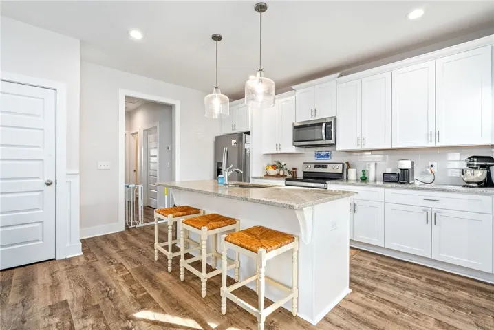 Kitchen and dining areas connect naturally to the living space.