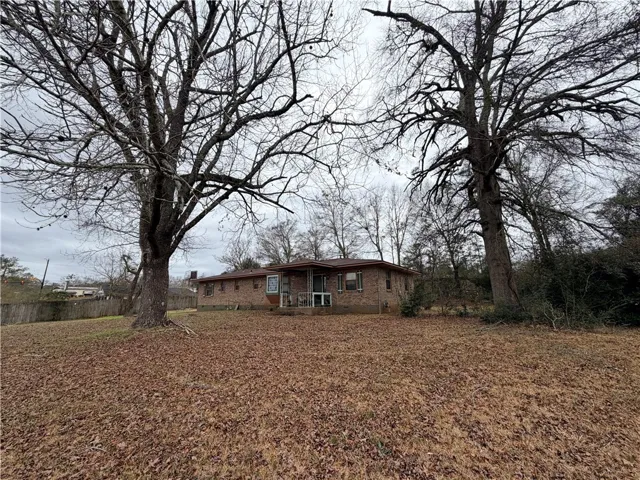 Current front view of property with dwelling.