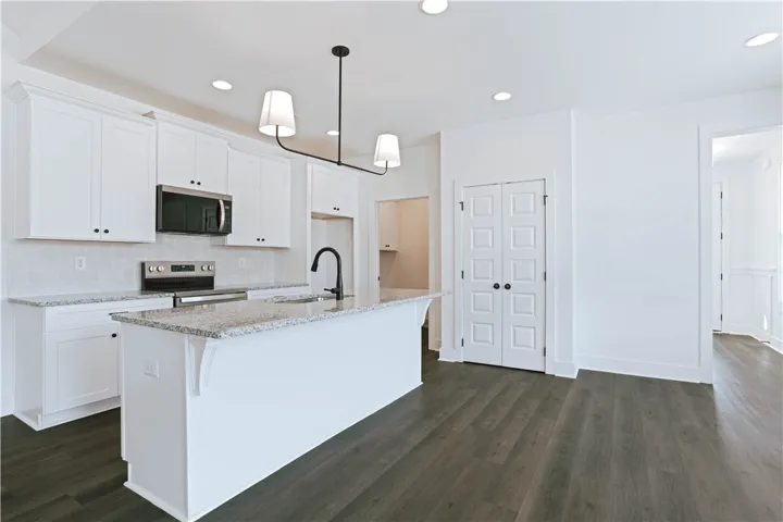 Delta Plumbing Fixtures & Soft Close Cabinets - Example of a completed Exterior Unit Townhome