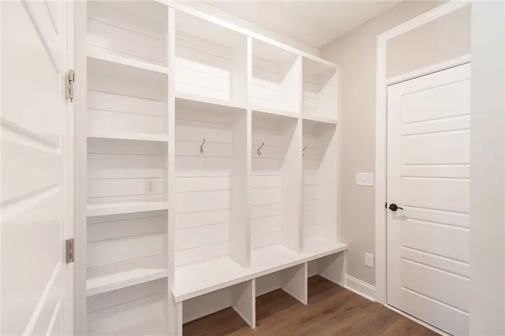 This mudroom offers practical built-in storage, enhancing organization and functionality within the home.