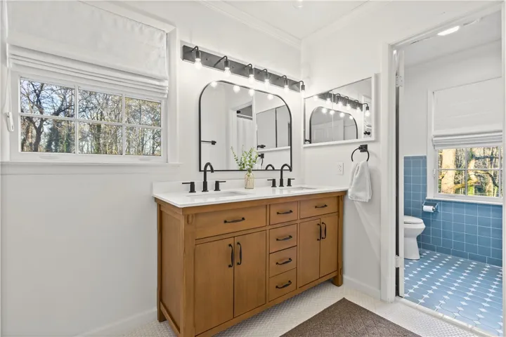 Updated full bath on second floor!  Complements owner's bath and also original aspects of this one!