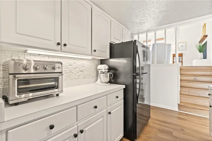 View leads up to family den.  Spaces are connected but differentiated - very neat!