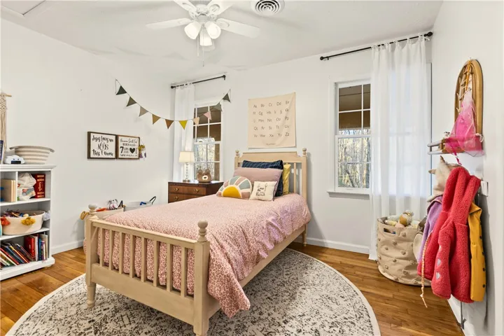2nd of 3 upstairs bedrooms - still wood floors!