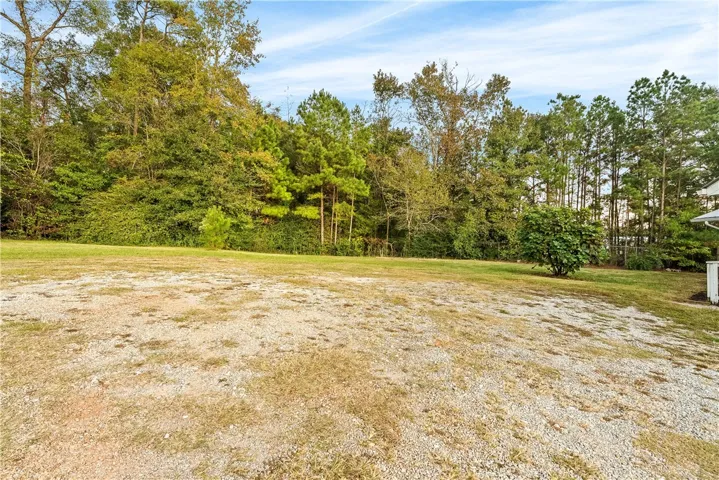 Plenty of parking space and level back yard