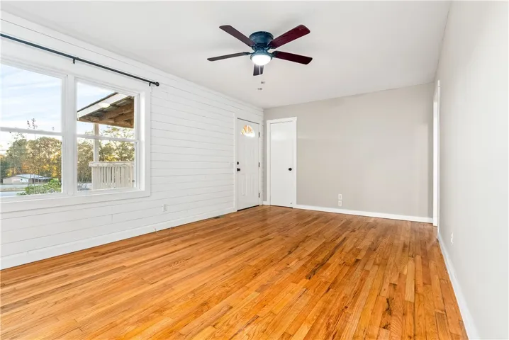 Inside updated Shiplap walls and original refinished wood floors