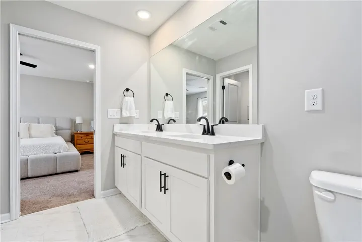 double vanity convenience in primary bedroom en-suite