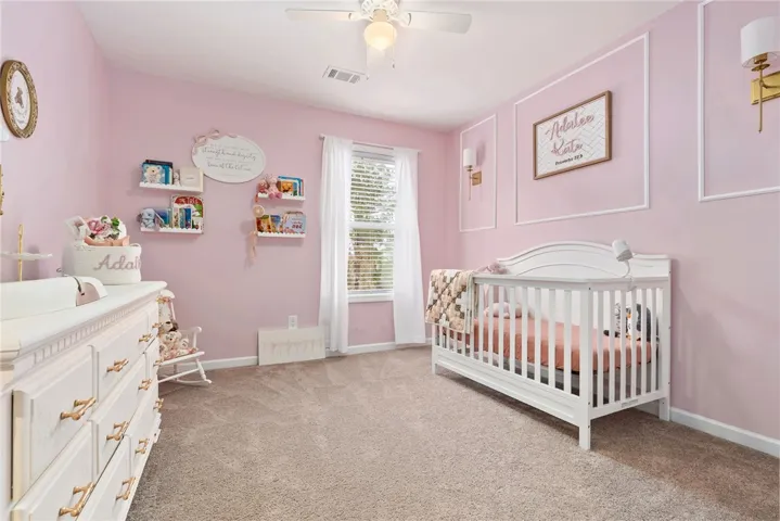one of the three guest rooms; all rooms are well sized with ample closet space