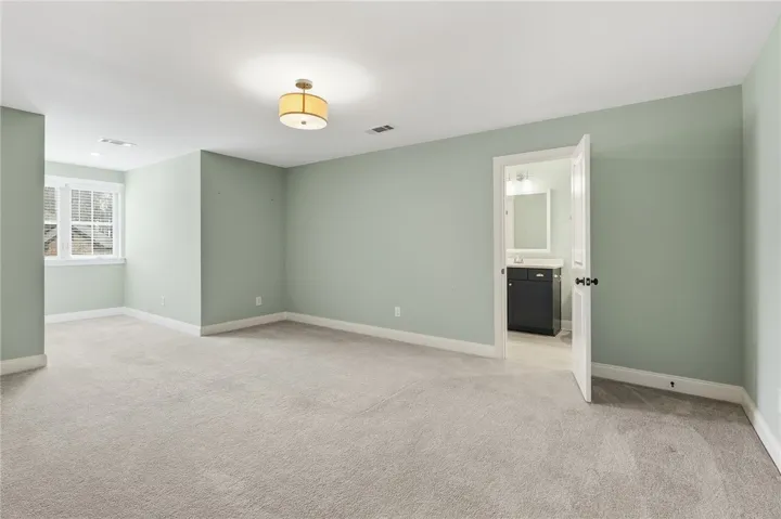 Upstairs, bedroom four provides ample space and versatility as a bonus room, media area, or playroom.