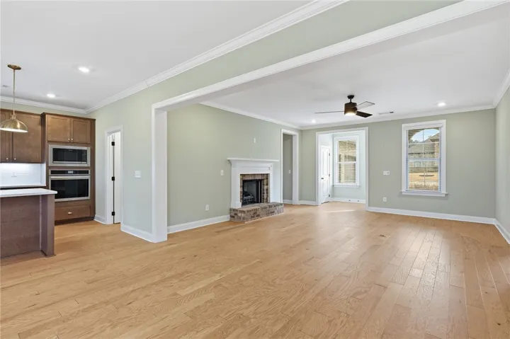 The walls introduce a subtle touch of color to the otherwise neutral space.