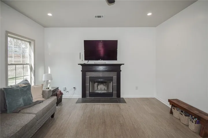 main living area with wood burning fireplace